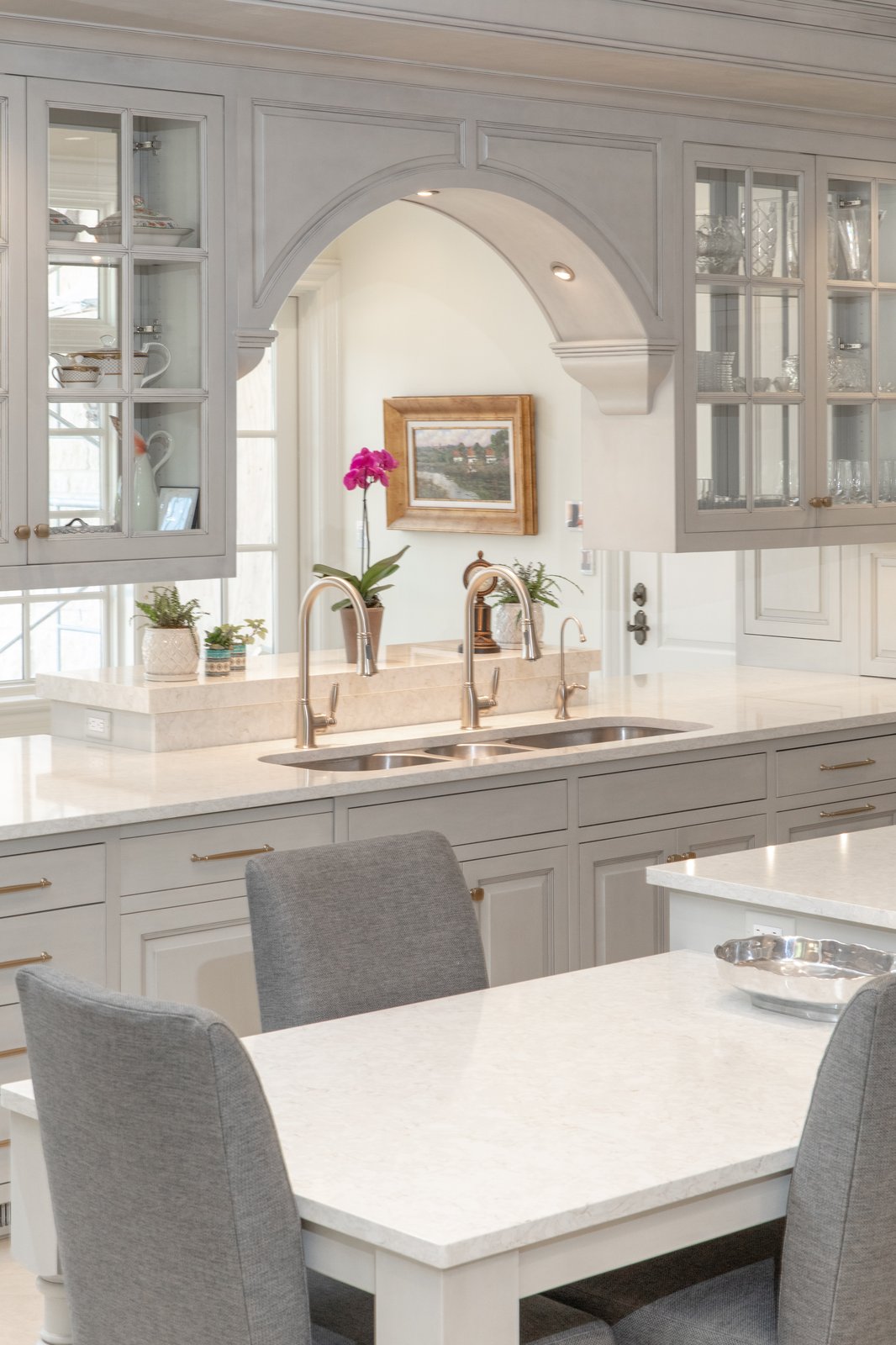 Elegant traditional kitchen in bluish gray painted cabinets