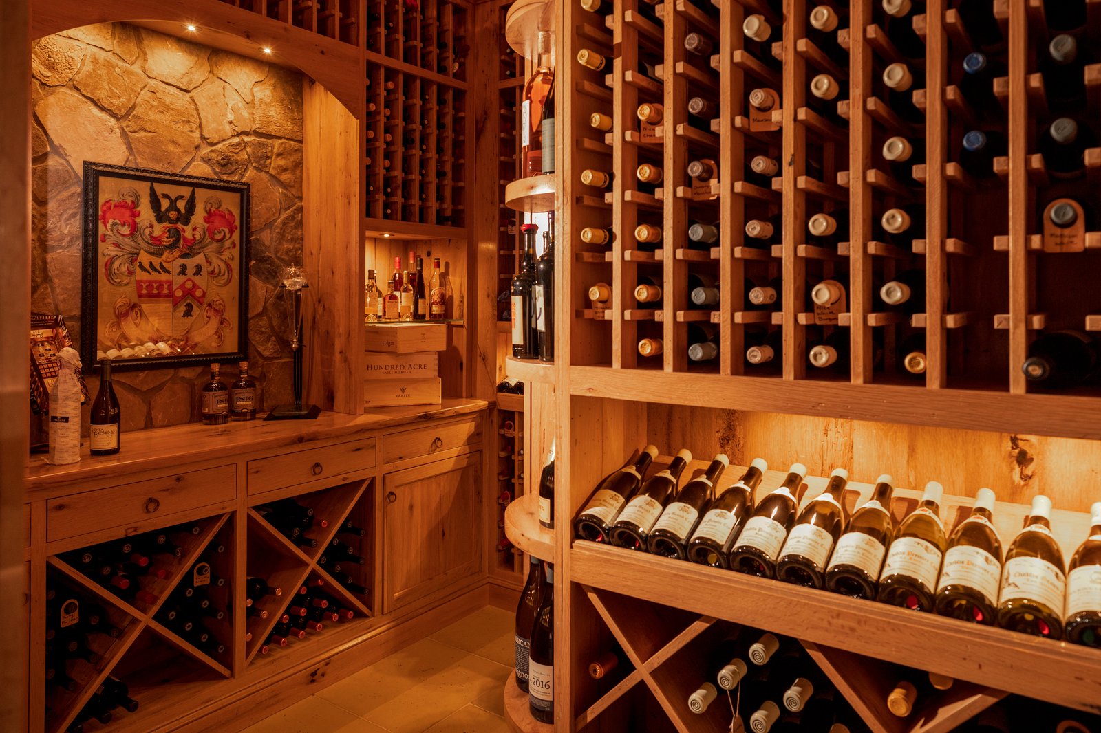 Custom wine room with antique white oak by Ana Woodworks